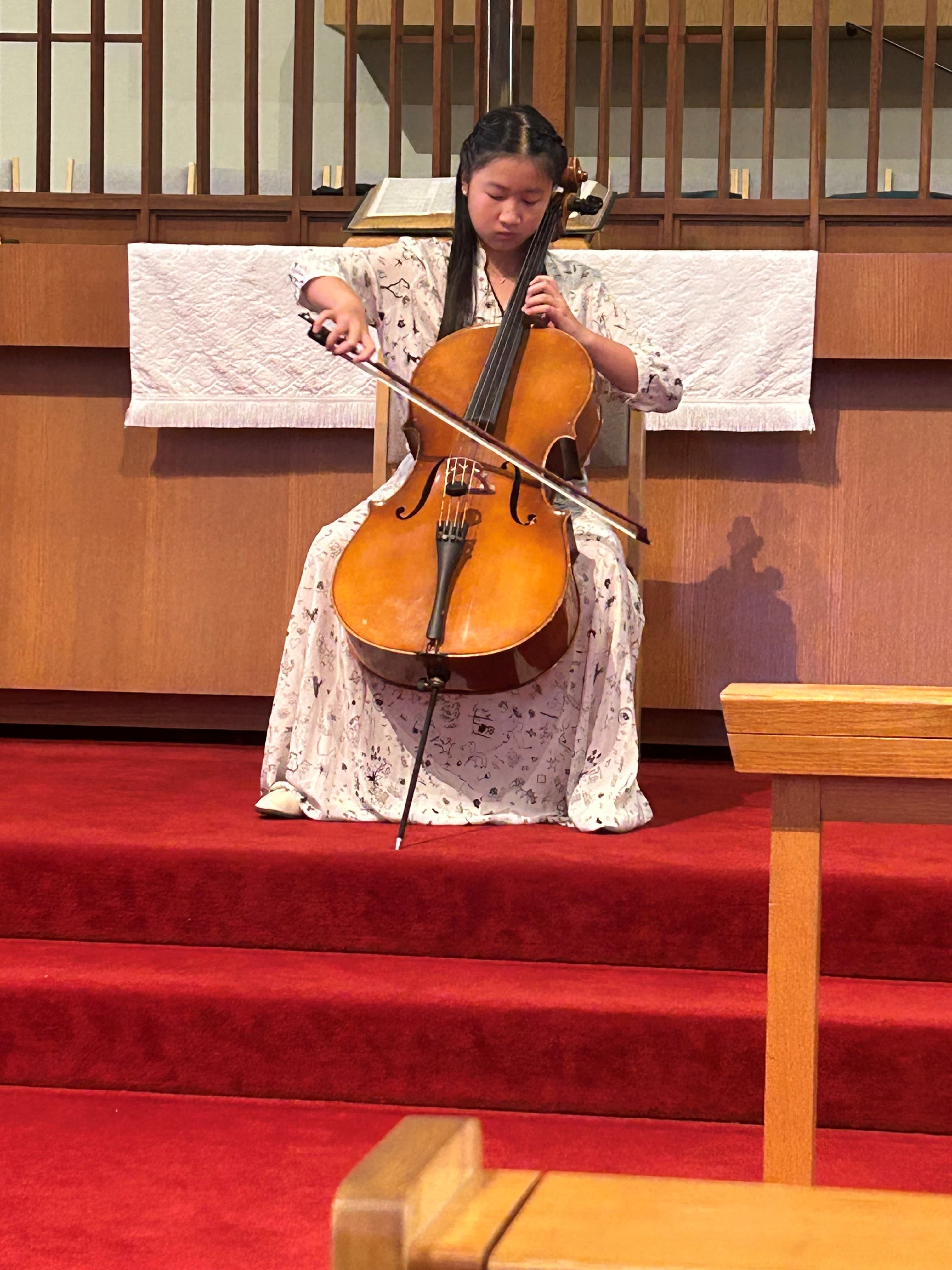 Young cellist performing at a KSA recital