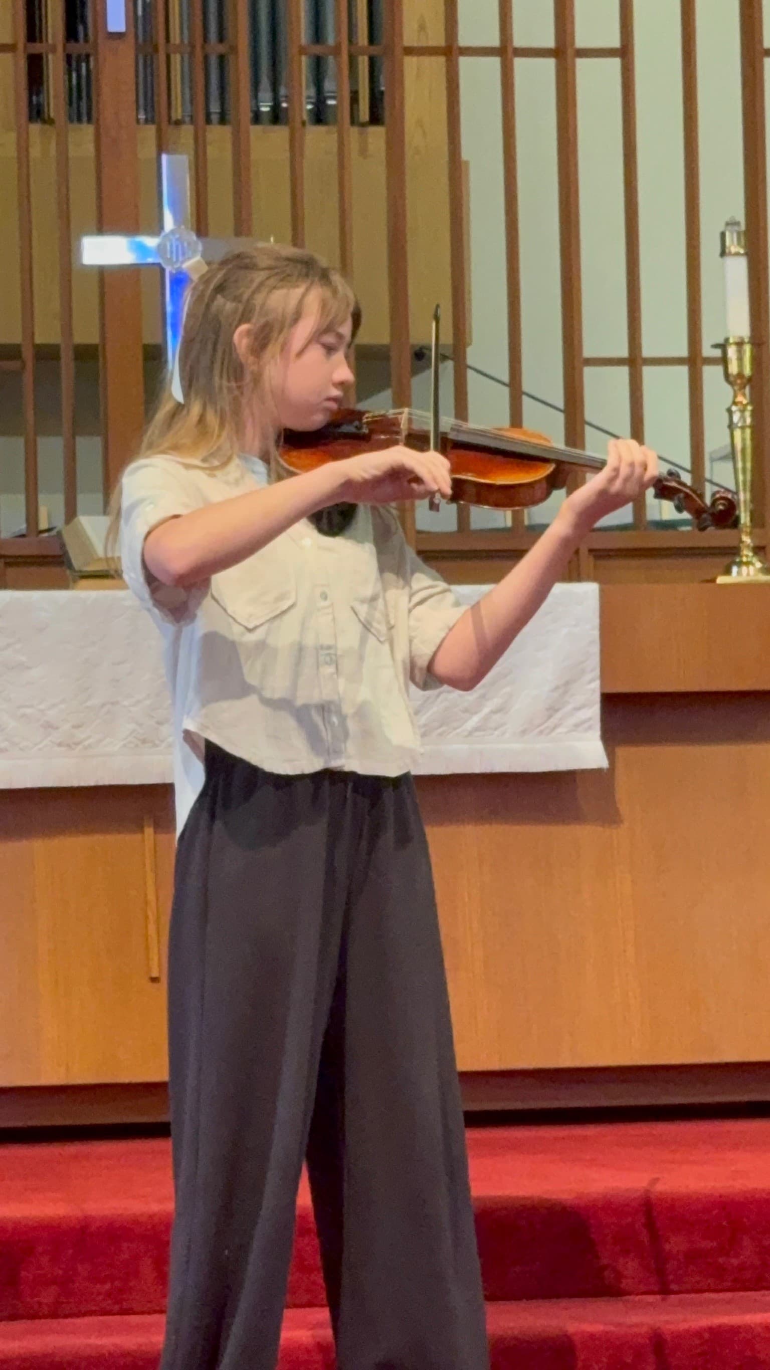 Young string player performing at a KSA recital