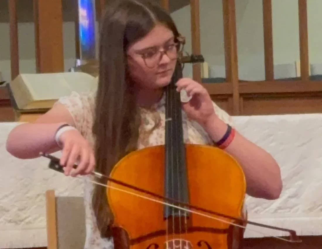 A young KSA cellist performing at a recital